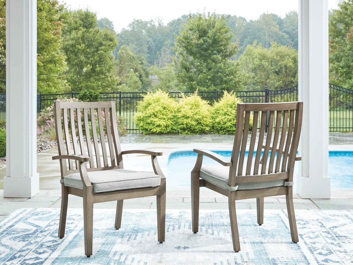 Rainier Ranch Brown/Beige Outdoor Arm Chair with Cushion (Set of 2) by Ashley at Eve Furniture