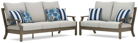 Rainier Ranch Brown/Beige Outdoor Sofa and Loveseat by Ashley at Eve Furniture