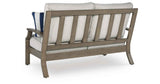 Rainier Ranch Brown/Beige Outdoor Sofa and Loveseat by Ashley at Eve Furniture