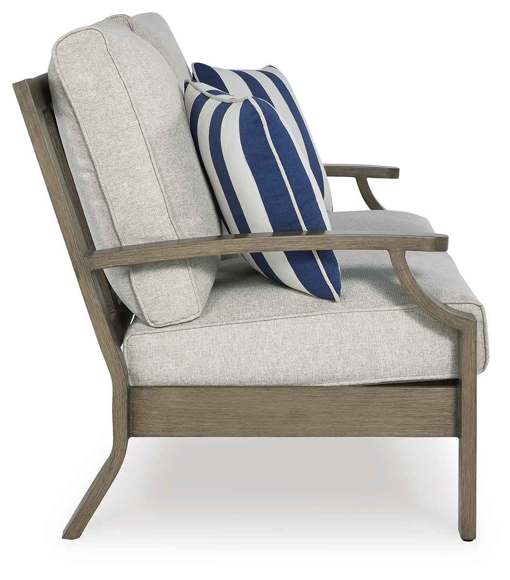 Rainier Ranch Brown/Beige Outdoor Sofa and Loveseat by Ashley at Eve Furniture
