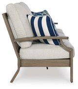 Rainier Ranch Brown/Beige Outdoor Sofa and Loveseat by Ashley at Eve Furniture