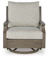 Rainier Ranch Brown/Beige Outdoor Swivel Glider Chair with Cushion by Ashley at Eve Furniture