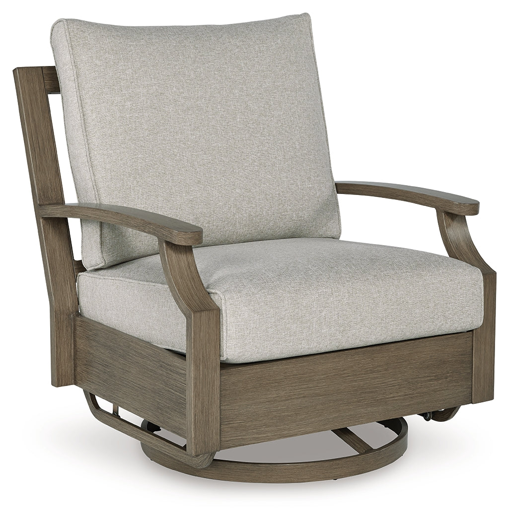 Rainier Ranch Brown/Beige Outdoor Swivel Glider Chair with Cushion by Ashley at Eve Furniture