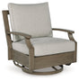 Rainier Ranch Brown/Beige Outdoor Swivel Glider Chair with Cushion by Ashley at Eve Furniture