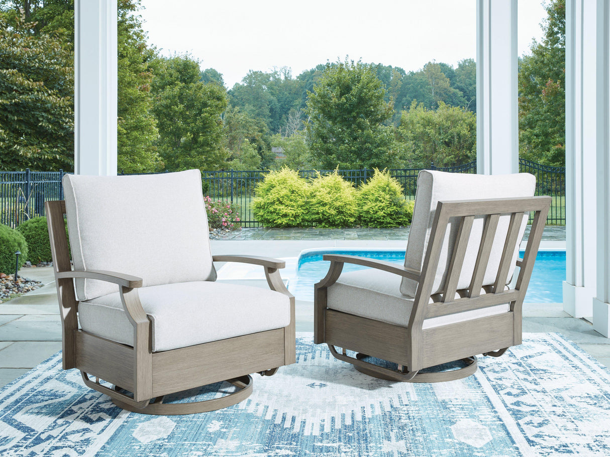 Rainier Ranch Outdoor Swivel Glider Chair with Cushion by Ashley at Eve Furniture