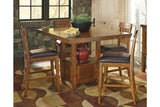 Ralene Medium Brown Counter Height Dining Extension Table by Ashley at Eve Furniture