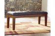 Ralene Medium Brown Dining Bench by Ashley at Eve Furniture