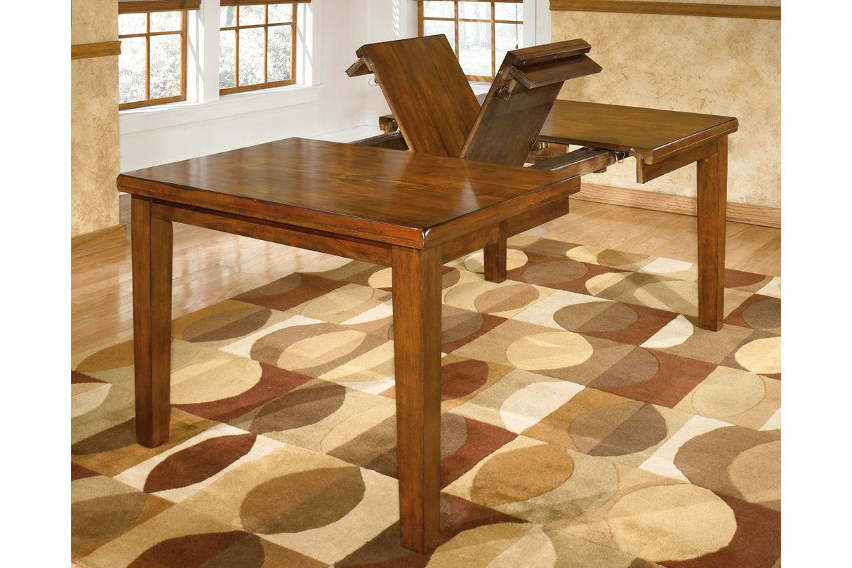 Ralene Medium Brown Dining Extension Table by Ashley at Eve Furniture