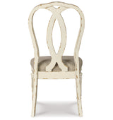 Realyn Chipped White Dining Table and 8 Ribbon Back Chairs by Ashley at Eve Furniture
