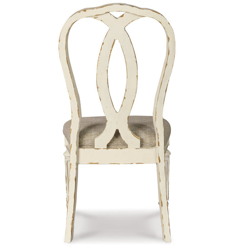 Realyn Chipped White Dining Table and 8 Ribbon Back Chairs by Ashley at Eve Furniture