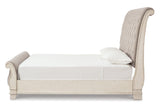Realyn Chipped White King Sleigh Bed by Ashley at Eve Furniture