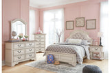 Realyn Chipped White Nightstand by Ashley at Eve Furniture