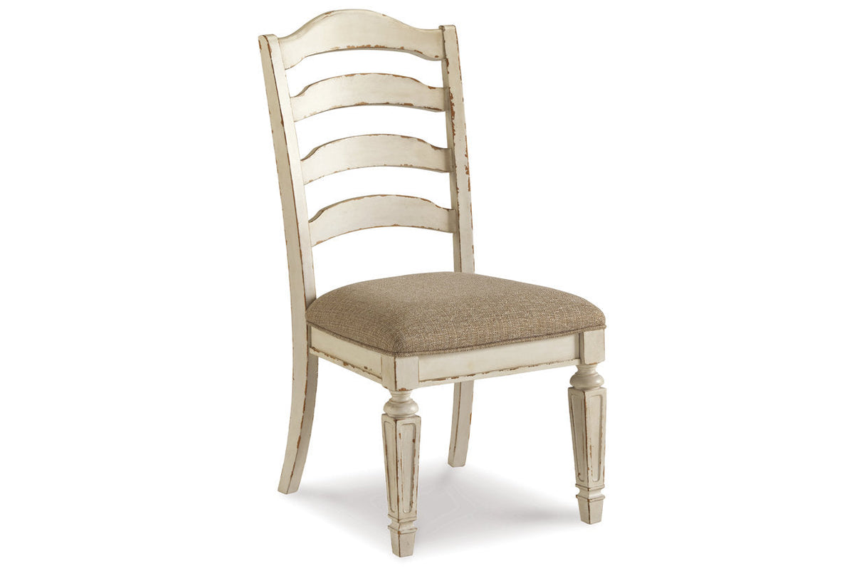 Realyn Chipped White Oval Dining Table and 6 Ladder Back Chairs by Ashley at Eve Furniture