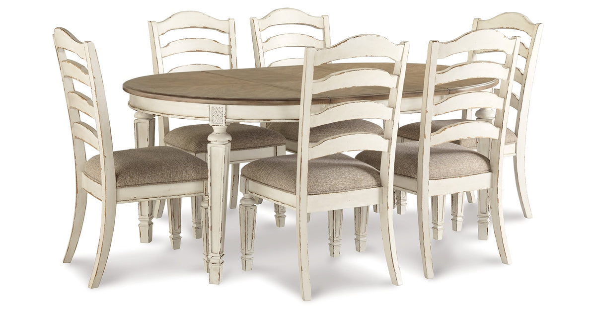 Realyn Chipped White Oval Dining Table and 6 Ladder Back Chairs by Ashley at Eve Furniture