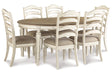 Realyn Chipped White Oval Dining Table and 6 Ladder Back Chairs by Ashley at Eve Furniture