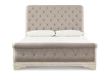 Realyn Chipped White Queen Sleigh Bed by Ashley at Eve Furniture