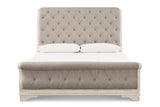 Realyn Chipped White Queen Sleigh Bed by Ashley at Eve Furniture