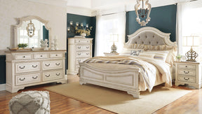Realyn Chipped White Upholstered Panel Bedroom Set by Ashley at Eve Furniture