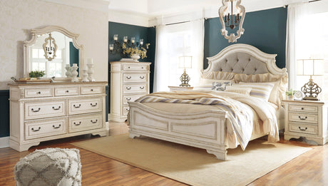 Realyn Chipped White Upholstered Panel Bedroom Set by Ashley at Eve Furniture