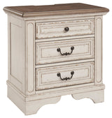 Realyn Chipped White Upholstered Sleigh Bedroom Set by Ashley at Eve Furniture