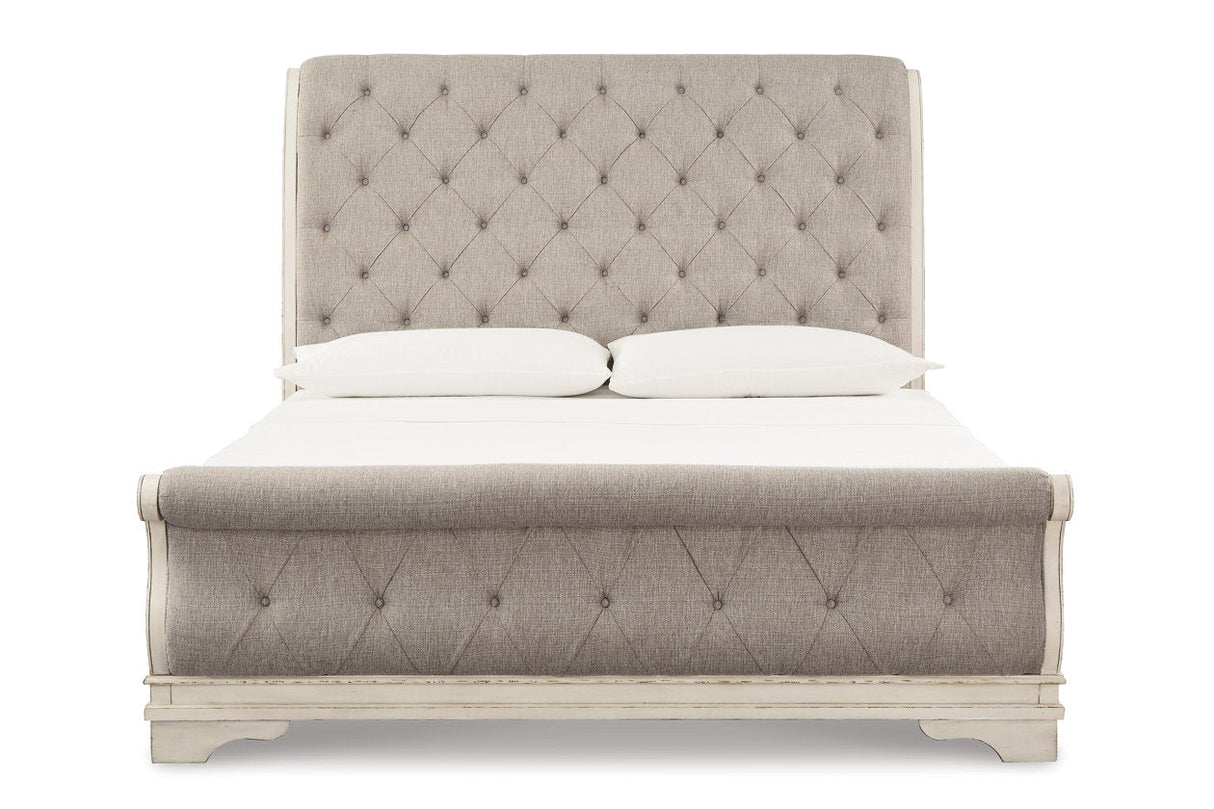 Realyn Chipped White Upholstered Sleigh Bedroom Set by Ashley at Eve Furniture