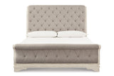 Realyn Chipped White Upholstered Sleigh Bedroom Set by Ashley at Eve Furniture