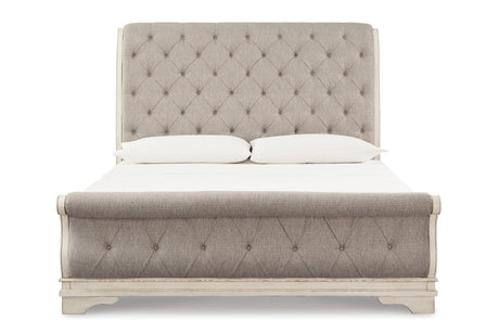 Realyn Chipped White Upholstered Sleigh Bedroom Set by Ashley at Eve Furniture