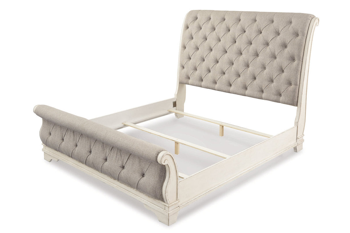 Realyn Chipped White Upholstered Sleigh Bedroom Set by Ashley at Eve Furniture