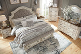 Realyn Chipped White Upholstered Storage Platform Bedroom Set with Footboard Bench by Ashley at Eve Furniture