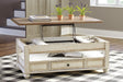 Realyn White/Brown Coffee Table with Lift Top by Ashley at Eve Furniture