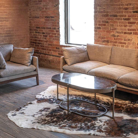 Reno 43" Coffee Table with Black Marble and Antique Brass Base by Home Trends & Design at Eve Furniture