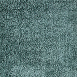 Sason Turquoise Area Rug