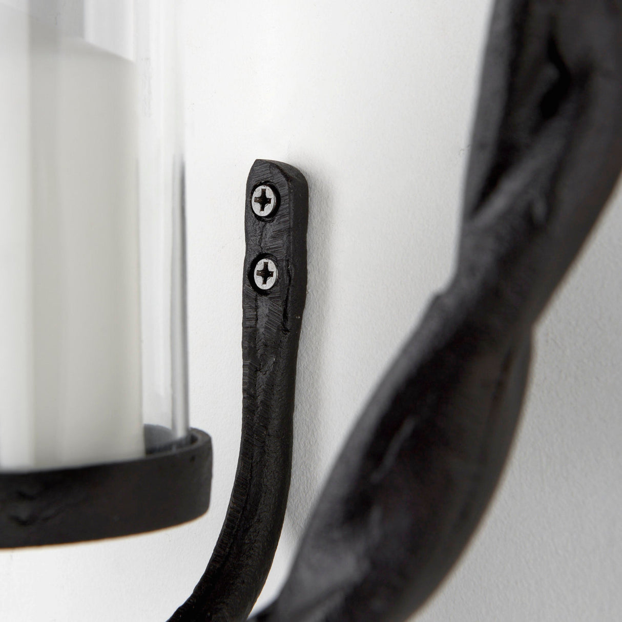 Rizwan 12.0L x 14.0W x 4.5H Black Aluminum Braided Circular Candle Holder by Mercana at Eve Furniture