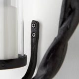 Rizwan 12.0L x 14.0W x 4.5H Black Aluminum Braided Circular Candle Holder by Mercana at Eve Furniture