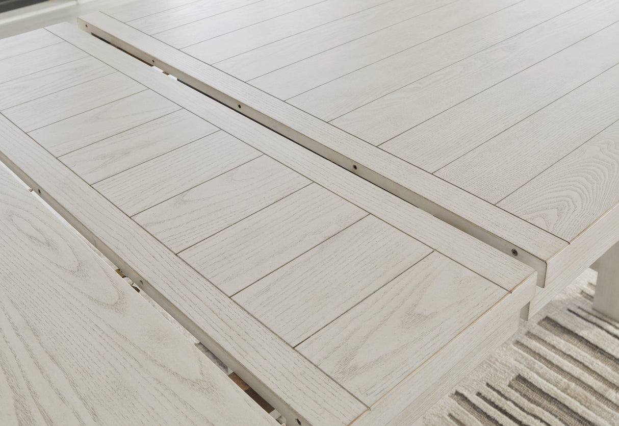 Robbinsdale Antique White Counter Height Dining Table and 8 Barstools by Ashley at Eve Furniture