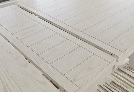 Robbinsdale Antique White Counter Height Dining Table and 8 Barstools by Ashley at Eve Furniture