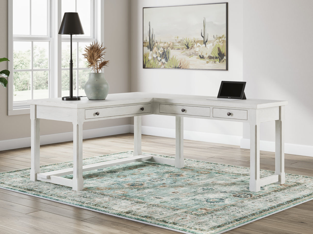 Robbinsdale Antique White L-Shaped Home Office Desk by Ashley at Eve Furniture