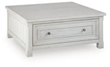 Robbinsdale Antique White Lift-Top Coffee Table by Ashley at Eve Furniture
