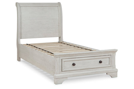 Robbinsdale Antique White Twin Sleigh Storage Platform Bed by Ashley at Eve Furniture