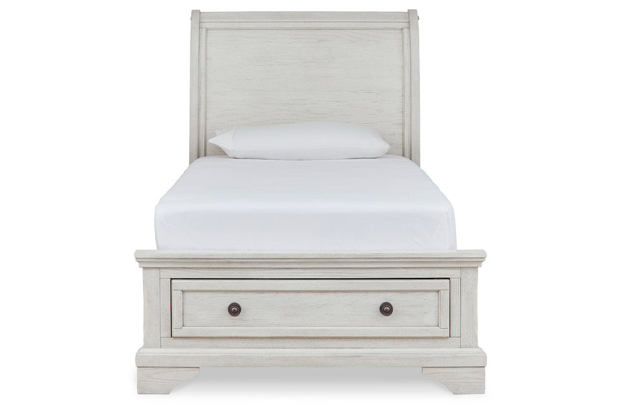 Robbinsdale Antique White Twin Sleigh Storage Platform Bed by Ashley at Eve Furniture