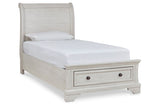 Robbinsdale Antique White Twin Sleigh Storage Platform Bed by Ashley at Eve Furniture