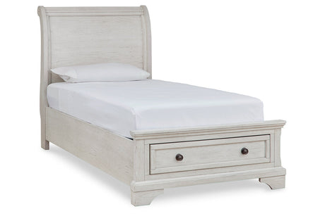 Robbinsdale Antique White Twin Sleigh Storage Platform Bed by Ashley at Eve Furniture
