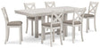 Robbinsdale Counter Height Dining Table and 6 Barstools in Antique White by Ashley at Eve Furniture