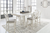 Robbinsdale Counter Height Dining Table and 6 Barstools in Antique White by Ashley at Eve Furniture
