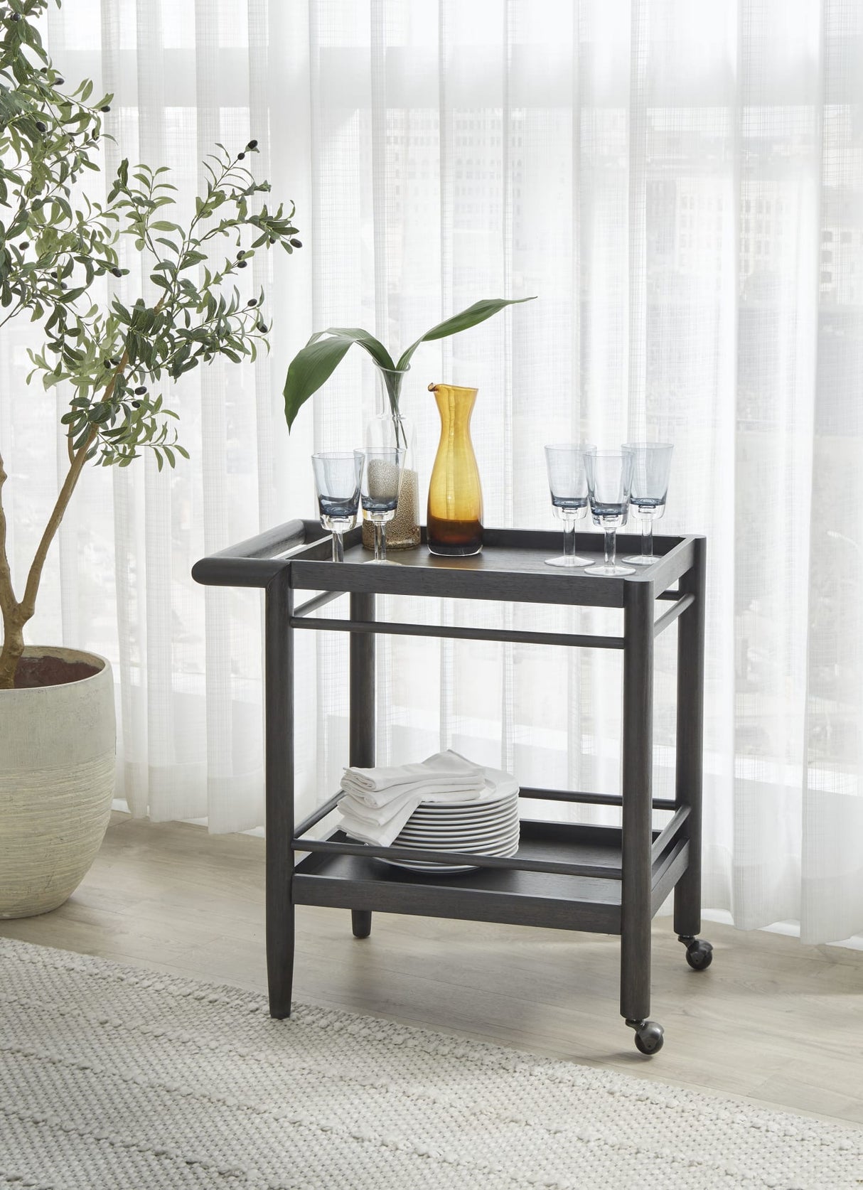 Rockport Yin Two Shelf Rolling Bar Cart by Modus Furniture at Eve Furniture
