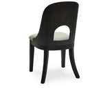 Rowanbeck Dining Table and 6 Chairs with Storage in Black by Ashley at Eve Furniture
