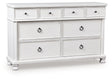 Rowlenstown Antique White Dresser by Ashley at Eve Furniture
