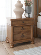 Rowlenstown Brown Poster Bedroom Set by Ashley at Eve Furniture