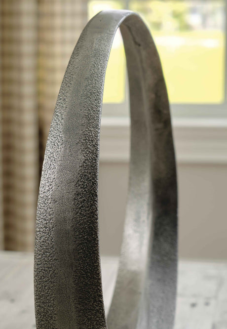Ryandale Antique Pewter Finish Sculpture by Ashley at Eve Furniture