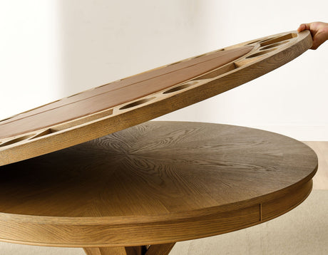 Rylie 48-inch Round Dining Table with Folding Game Top, Natural Finish by Steve Silver at Eve Furniture